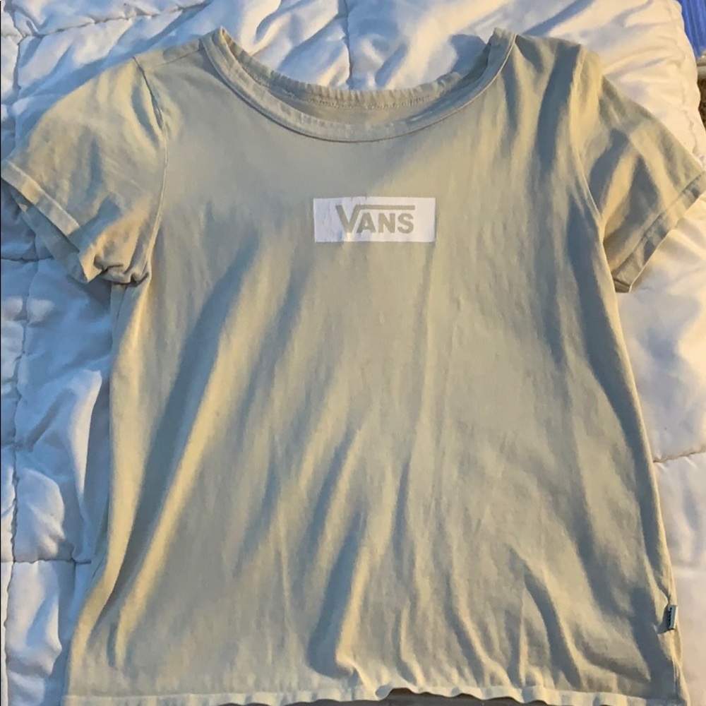 a pastel yellow vans shirt